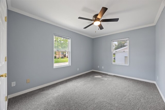 2220 D St SW, Cedar Rapids, IA 52404 - carpeted empty room featuring baseboards, ceiling fan, and crown molding