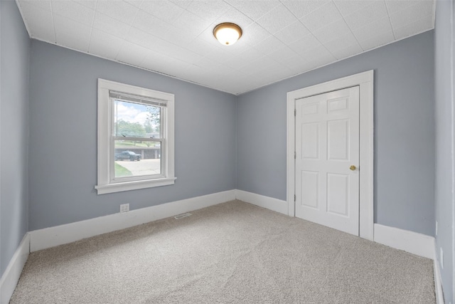 2220 D St SW, Cedar Rapids, IA 52404 - unfurnished bedroom with carpet