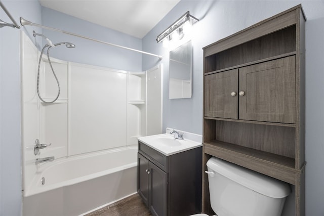 2220 D St SW, Cedar Rapids, IA 52404 - bathroom with vanity, bathing tub / shower combination, toilet, and wood finished floors