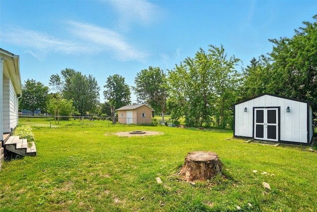 1727 Northbrook Dr NE, Cedar Rapids, IA 52402 - view of yard featuring an outdoor fire pit