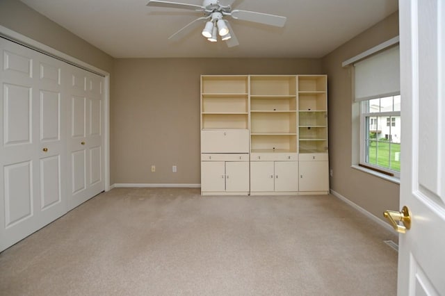 3730 Deer Valley Dr Unit B, Marion, IA 52302 - unfurnished bedroom with light colored carpet, baseboards, and ceiling fan