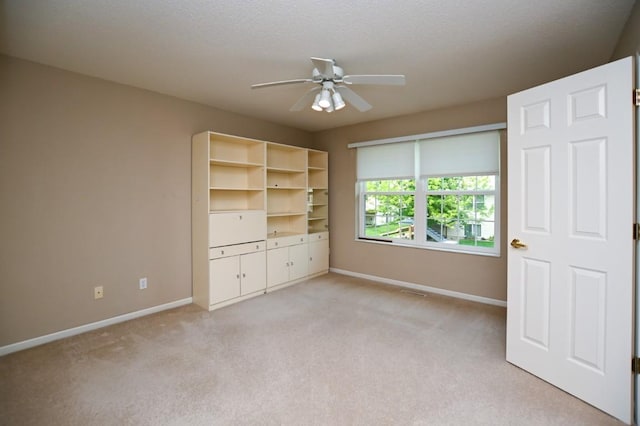 3730 Deer Valley Dr Unit B, Marion, IA 52302 - unfurnished bedroom featuring baseboards, light colored carpet, and ceiling fan