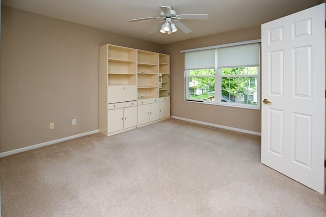 3730 Deer Valley Dr Unit B, Marion, IA 52302 - unfurnished room featuring baseboards, ceiling fan, and light carpet