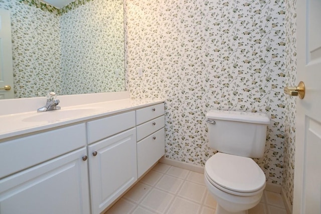 3730 Deer Valley Dr Unit B, Marion, IA 52302 - half bathroom with vanity, wallpapered walls, toilet, and baseboards