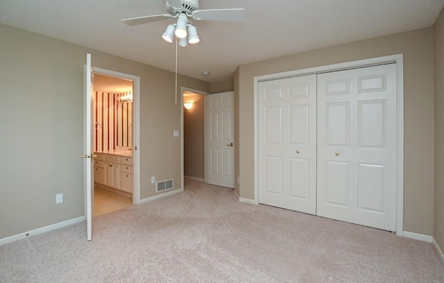 3730 Deer Valley Dr Unit B, Marion, IA 52302 - unfurnished bedroom with light colored carpet, baseboards, a closet, and ensuite bathroom