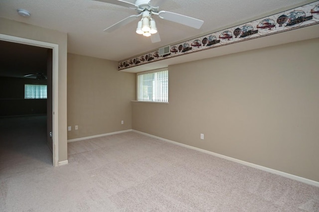 3730 Deer Valley Dr Unit B, Marion, IA 52302 - unfurnished room featuring light colored carpet, baseboards, a smoke detector, and ceiling fan