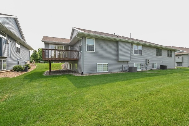 3730 Deer Valley Dr Unit B, Marion, IA 52302 - back of property featuring a deck, central AC unit, and a lawn
