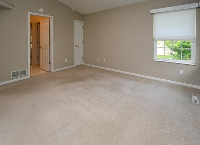 3730 Deer Valley Dr Unit B, Marion, IA 52302 - empty room with baseboards, lofted ceiling, and carpet