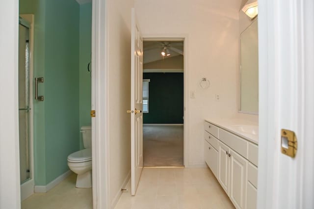 3730 Deer Valley Dr Unit B, Marion, IA 52302 - full bathroom with vanity, toilet, a shower stall, tile patterned flooring, and ceiling fan