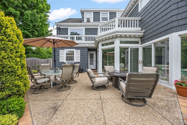 307 Crescent St SE, Cedar Rapids, IA 52403 - view of patio / terrace with a balcony and outdoor dining space