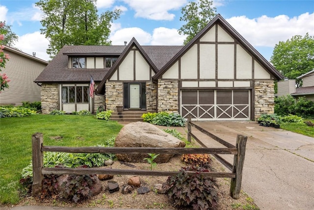 4633 Northwood Dr NE, Cedar Rapids, IA 52402 - english style home with stone siding, stucco siding, and concrete driveway
