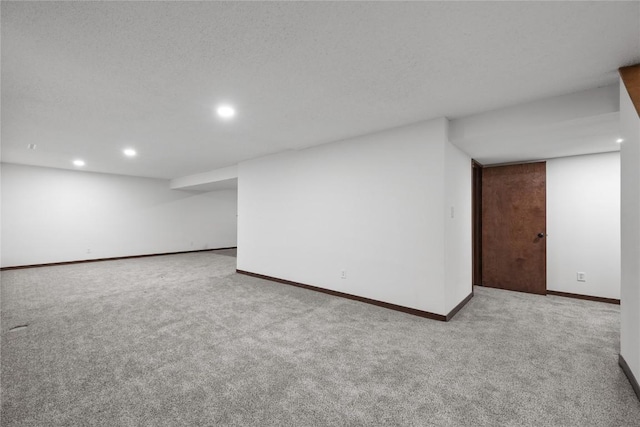 4633 Northwood Dr NE, Cedar Rapids, IA 52402 - finished below grade area with recessed lighting, carpet floors, and baseboards