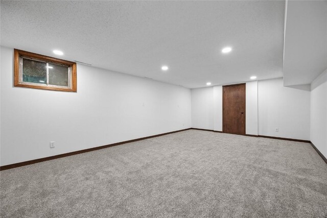4633 Northwood Dr NE, Cedar Rapids, IA 52402 - finished below grade area with recessed lighting, carpet flooring, and baseboards