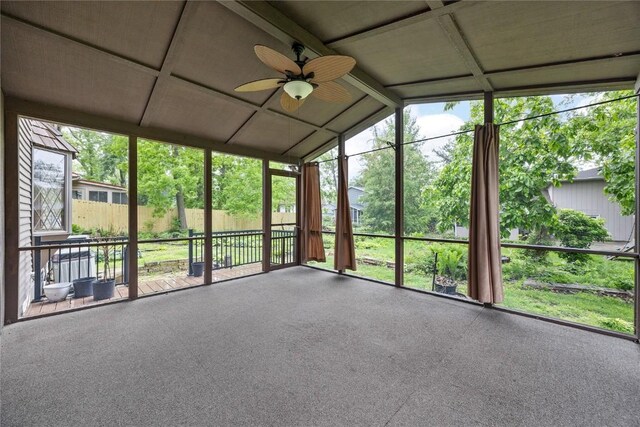 4633 Northwood Dr NE, Cedar Rapids, IA 52402 - unfurnished sunroom with ceiling fan and lofted ceiling