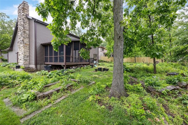 4633 Northwood Dr NE, Cedar Rapids, IA 52402 - view of yard featuring a sunroom