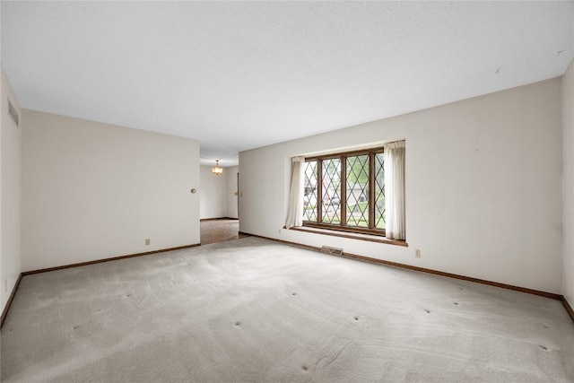 4633 Northwood Dr NE, Cedar Rapids, IA 52402 - spare room with carpet and baseboards