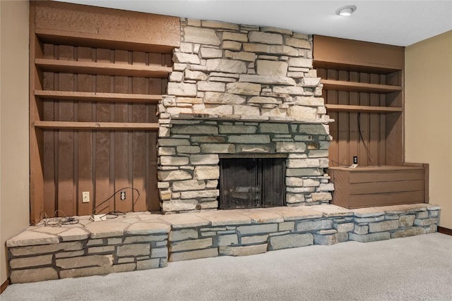 4633 Northwood Dr NE, Cedar Rapids, IA 52402 - unfurnished living room featuring carpet, a fireplace, baseboards, and built in features