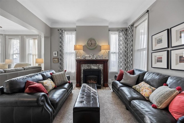 320 E St, Tipton, IA 52772 - living area featuring plenty of natural light and a premium fireplace