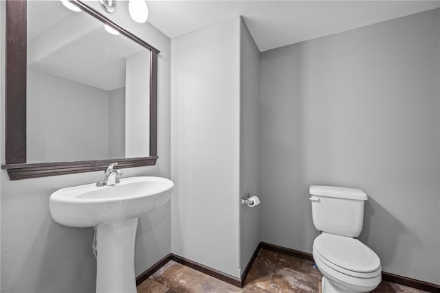 3806 English Glen Ave, Marion, IA 52302 - bathroom with toilet and stone finish flooring