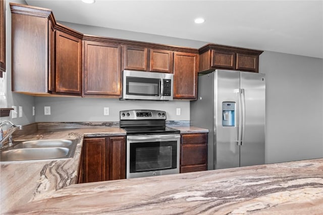 3806 English Glen Ave, Marion, IA 52302 - kitchen featuring stainless steel appliances, recessed lighting, and light stone countertops