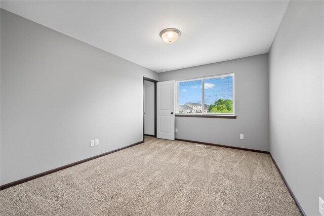 3806 English Glen Ave, Marion, IA 52302 - spare room with light colored carpet
