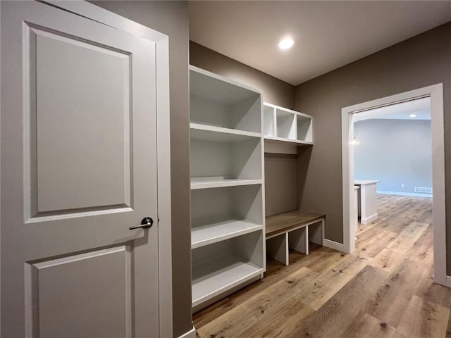 1417 Legend Dr, Tiffin, IA 52340 - mudroom featuring wood finished floors, baseboards, and recessed lighting