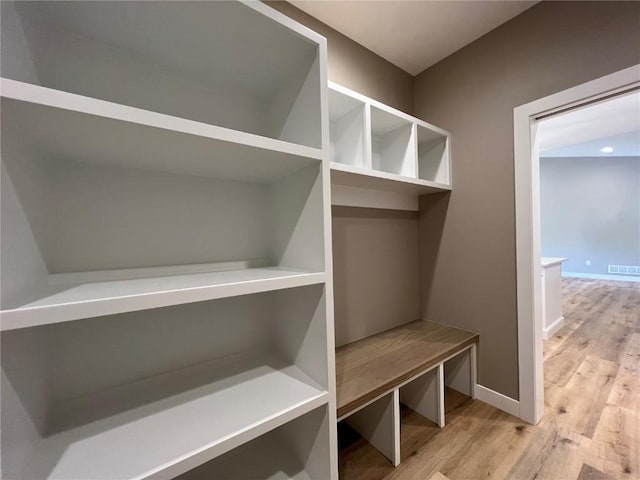 1417 Legend Dr, Tiffin, IA 52340 - mudroom featuring wood finished floors and baseboards