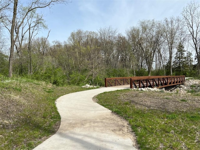 1417 Legend Dr, Tiffin, IA 52340 - surrounding community featuring a forest view