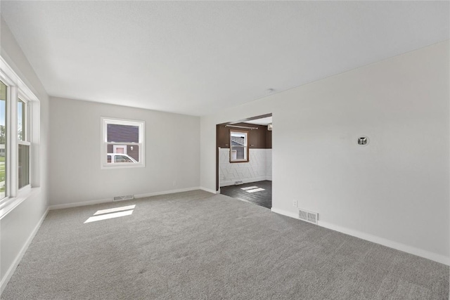 3013 Ravenwood Ter NW, Cedar Rapids, IA 52405 - spare room with carpet flooring and baseboards