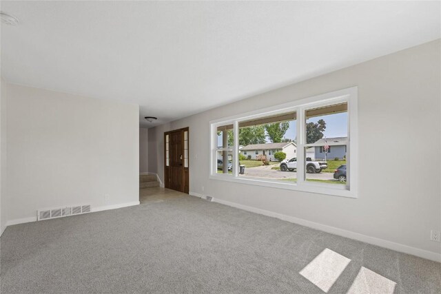 3013 Ravenwood Ter NW, Cedar Rapids, IA 52405 - carpeted empty room featuring baseboards