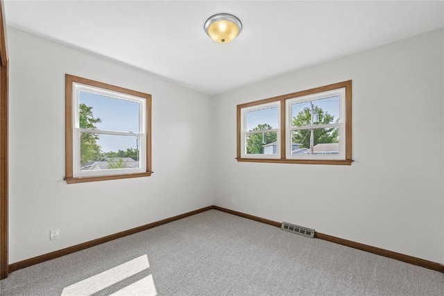 3013 Ravenwood Ter NW, Cedar Rapids, IA 52405 - carpeted spare room featuring baseboards