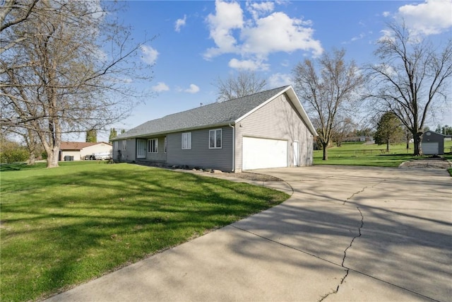 6405 Hillcrest Rd, Cedar Rapids, IA 52404 - view of home's exterior with driveway, a yard, and roof with shingles
