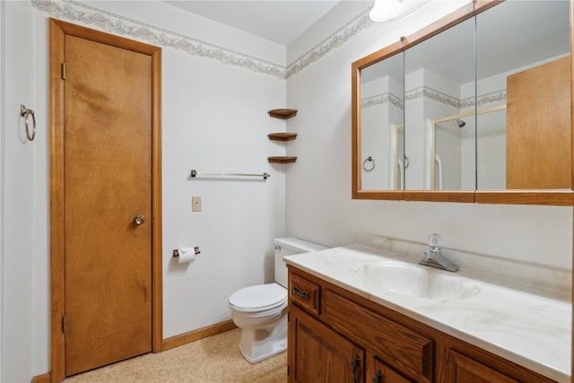 6405 Hillcrest Rd, Cedar Rapids, IA 52404 - full bath with vanity, a stall shower, toilet, and baseboards