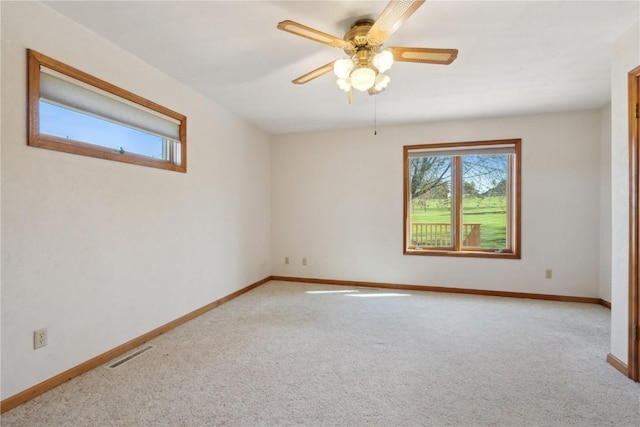6405 Hillcrest Rd, Cedar Rapids, IA 52404 - spare room with carpet flooring, baseboards, and a ceiling fan