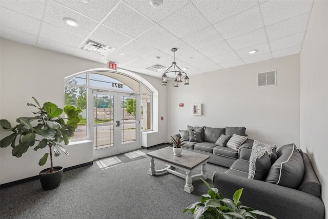 1871 Ellis Blvd NW Unit 309, Cedar Rapids, IA 52405 - living room with a paneled ceiling, baseboards, carpet, french doors, and recessed lighting