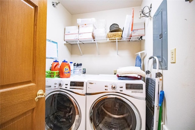 1701 130th St Unit 306, Anamosa, IA 52205 - washroom featuring electric panel and separate washer and dryer