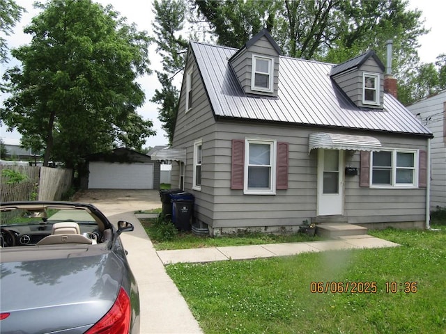 3125 Emerald Ave SE, Cedar Rapids, IA 52403 - cape cod house featuring an outbuilding and metal roof