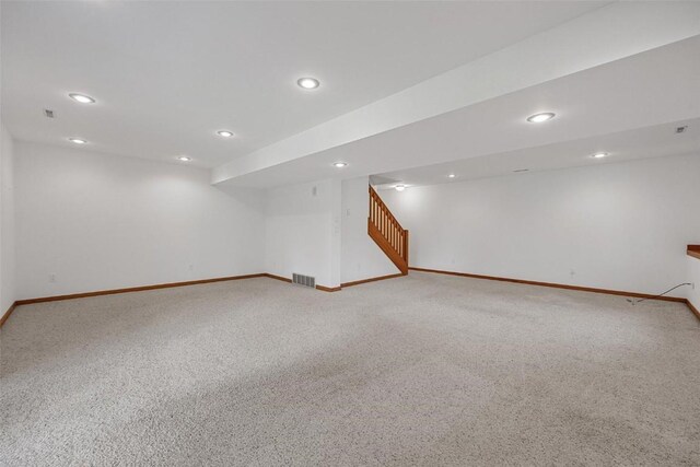 4644 Rapid Creek Trl NE, Iowa City, IA 52240 - finished basement with carpet, recessed lighting, and stairs