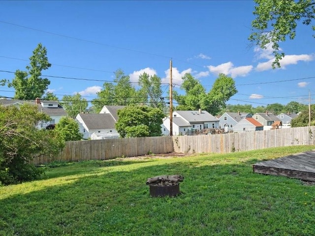 751 30th St NE, Cedar Rapids, IA 52402 - view of yard featuring a residential view and a fire pit