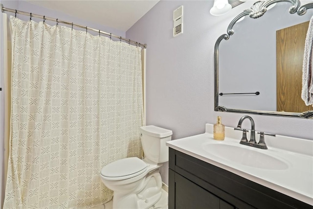 1015 Woodland Heights Ct SE Unit 14, Cedar Rapids, IA 52403 - bathroom with vanity, toilet, and curtained shower