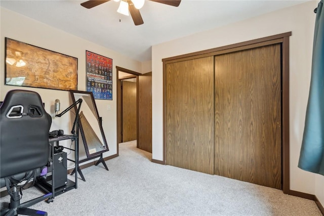 1015 Woodland Heights Ct SE Unit 14, Cedar Rapids, IA 52403 - carpeted office featuring a ceiling fan and baseboards