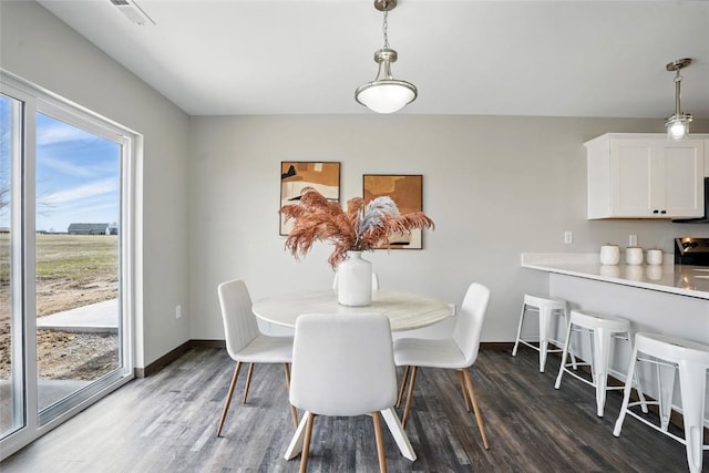 2004 Croell Ave, Tiffin, IA 52340 - dining area with wood finished floors and baseboards