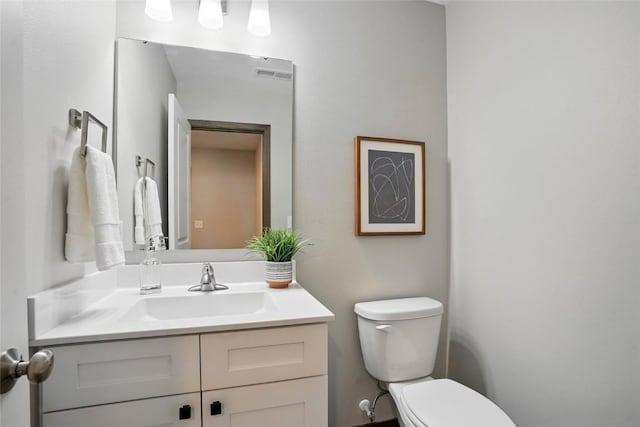 2004 Croell Ave, Tiffin, IA 52340 - half bathroom featuring toilet and vanity