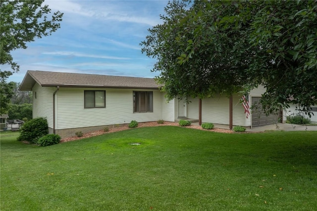 109 Oreole NE, Solon, IA 52333 - view of front of home with a front lawn, an attached garage, and concrete driveway