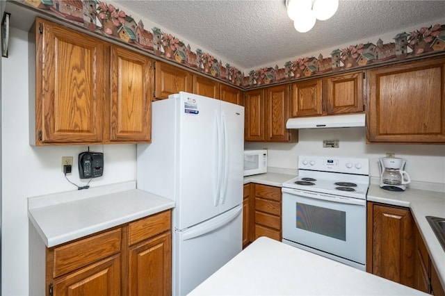109 Oreole NE, Solon, IA 52333 - kitchen with white appliances, under cabinet range hood, a textured ceiling, light countertops, and brown cabinetry