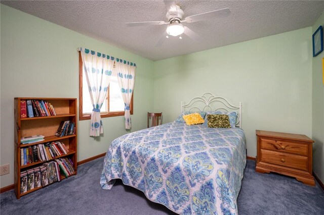 109 Oreole NE, Solon, IA 52333 - bedroom with carpet flooring, a textured ceiling, baseboards, and a ceiling fan