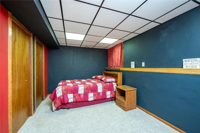 109 Oreole NE, Solon, IA 52333 - carpeted bedroom with a drop ceiling