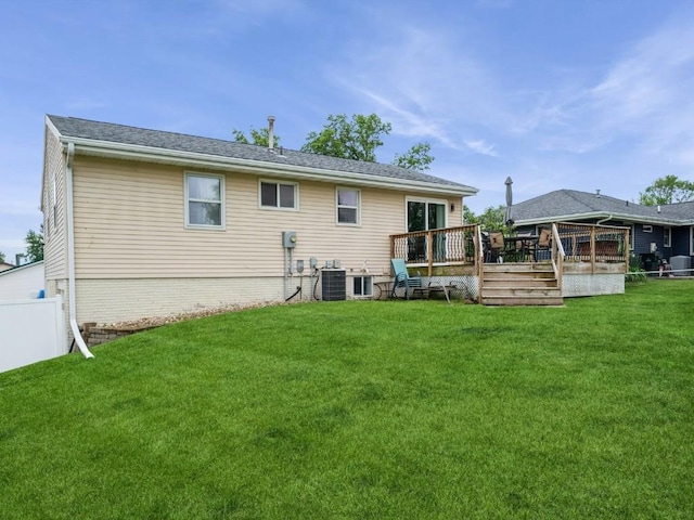 4721 Pine View Dr NE, Cedar Rapids, IA 52402 - back of property with a deck, central air condition unit, and a yard