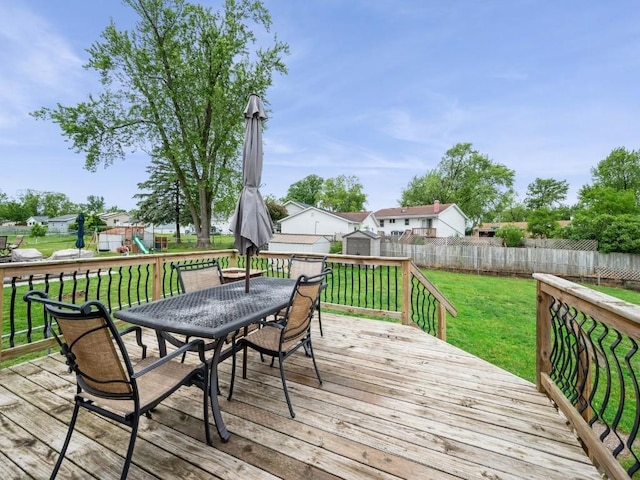 4721 Pine View Dr NE, Cedar Rapids, IA 52402 - deck featuring outdoor dining space, a playground, and a residential view