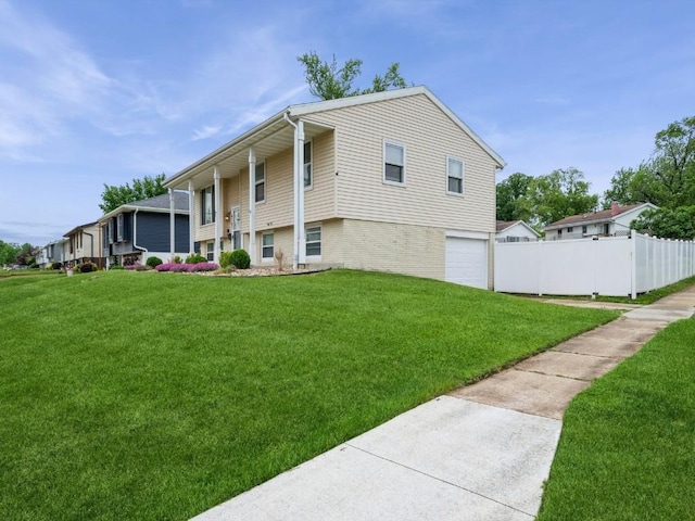 4721 Pine View Dr NE, Cedar Rapids, IA 52402 - view of property with a garage and driveway